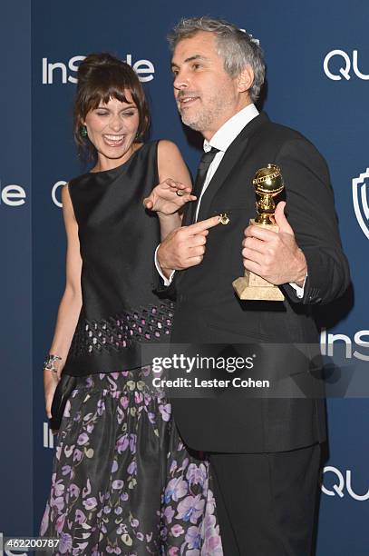 Director Alfonso Cuaron , winner of Best Director for 'Gravity,' and writer Sheherazade Goldsmith attend the 2014 InStyle And Warner Bros. 71st...