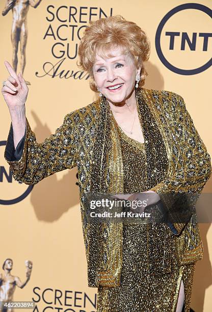 Actress Debbie Reynolds poses in the press room at the 21st Annual Screen Actors Guild Awards at The Shrine Auditorium on January 25, 2015 in Los...