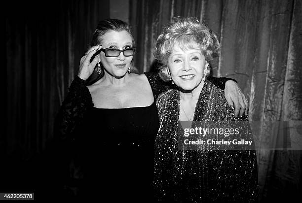 Actress Carrie Fisher and actress Debbie Reynolds attend TNT's 21st Annual Screen Actors Guild Awards at The Shrine Auditorium on January 25, 2015 in...