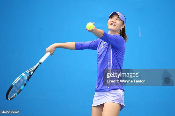 Shilin Xu of China in action in her match against Pranjala Yadlapalli of India during the Australian Open 2015 Junior Championships at Melbourne Park...