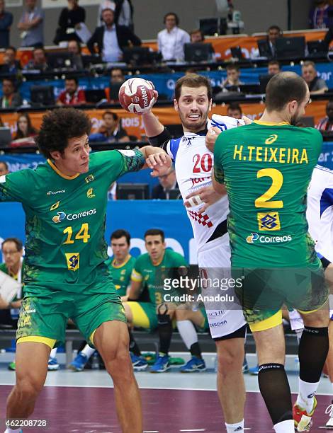 Brazil's Henrique Teixeira in action against Croatia's Damir Bicanic during the 24th Men's Handball World Championships Eighth Final EF7 match...