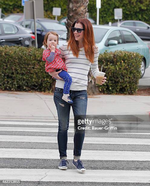 Alyson Hannigan and Keeva Denisof are seen on January 12, 2014 in Los Angeles, California.