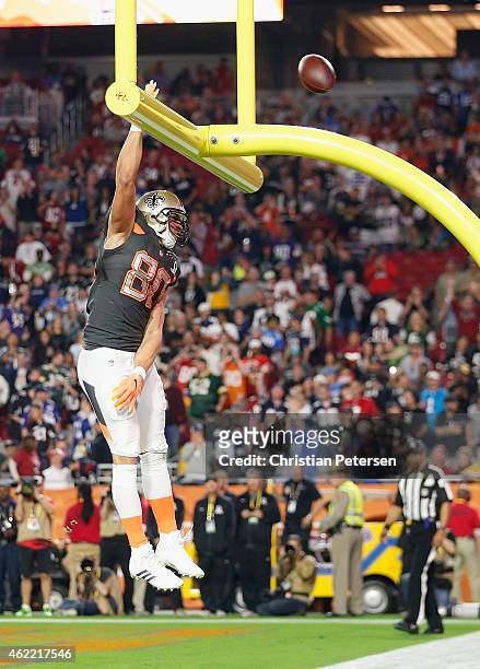 Team Irvin tight end Jimmy Graham of the New Orleans Saints celebrates a fourth quarter touchdown during the 2015 Pro Bowl at University of Phoenix...