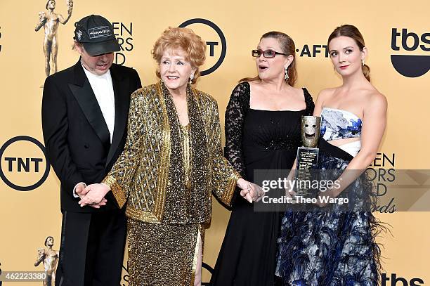 Todd Fisher, actress Debbie Reynolds, actress Carrie Fisher and Billie Lourd pose in the press room at TNT's 21st Annual Screen Actors Guild Awards...