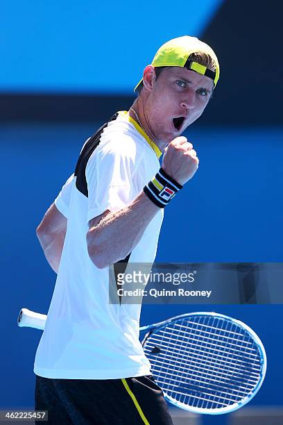 Matthew Ebden of Australia celebrates a point in his first round match against Nicolas Mahut of France during day one of the 2014 Australian Open at...