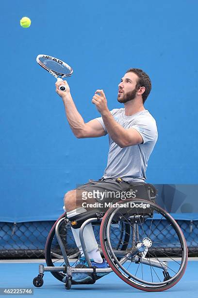 Adam Kellerman of Australia plays a forehand in his match against Ben Weekes of Australia during the Australian Open 2015 Wheelchair Championships at...