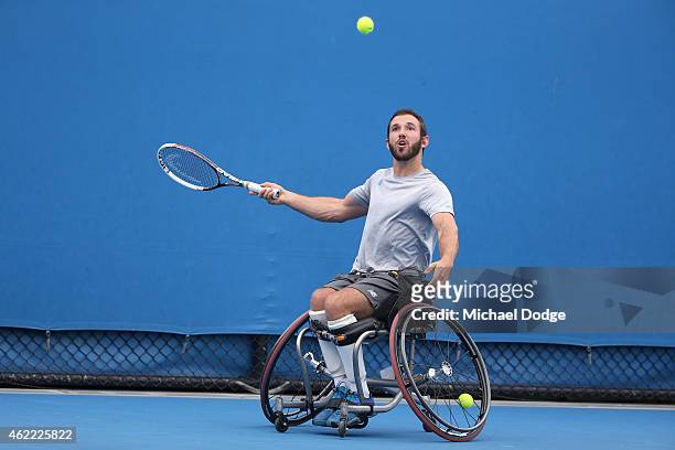 Adam Kellerman of Australia plays a forehand in his match against Ben Weekes of Australia during the Australian Open 2015 Wheelchair Championships at...
