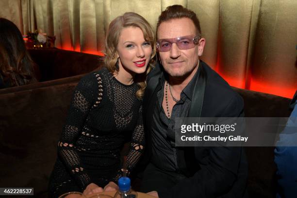Singer Taylor Swift and musician Bono attend The Weinstein Company & Netflix's 2014 Golden Globes After Party presented by Bombardier, FIJI Water,...