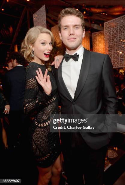 Singer Taylor Swift and Austin Swift attend The Weinstein Company & Netflix's 2014 Golden Globes After Party presented by Bombardier, FIJI Water,...