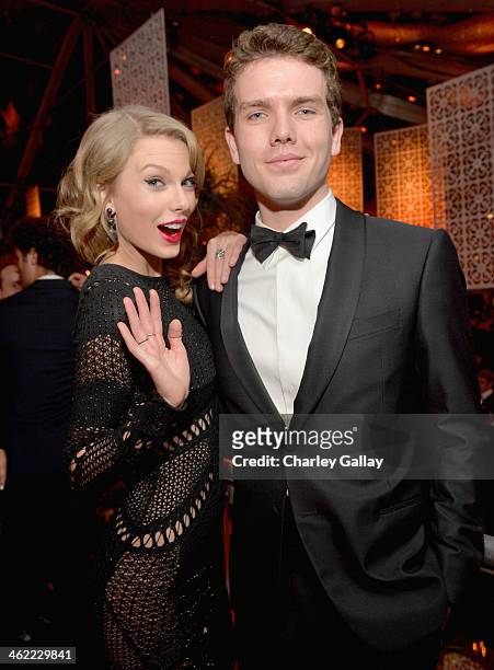 Singer Taylor Swift and Austin Swift attend The Weinstein Company & Netflix's 2014 Golden Globes After Party presented by Bombardier, FIJI Water,...