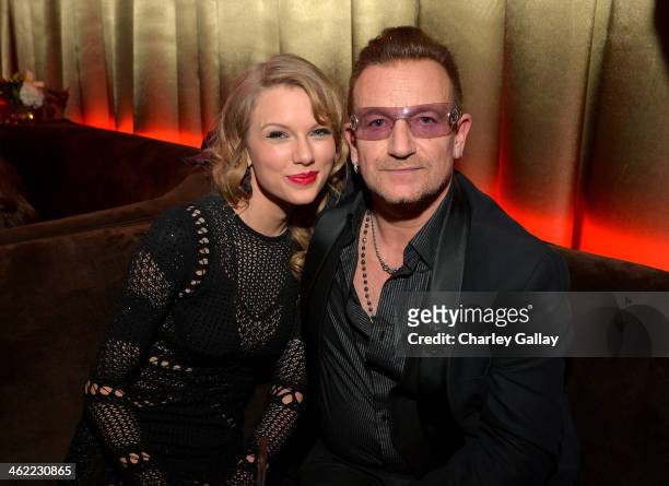 Singer Taylor Swift and musician Bono attend The Weinstein Company & Netflix's 2014 Golden Globes After Party presented by Bombardier, FIJI Water,...