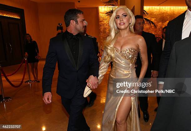 71st ANNUAL GOLDEN GLOBE AWARDS -- Pictured: Actor Taylor Kinney and singer Lady Gaga attend Universal, NBC, Focus Features, E! Sponsored by Chrysler...