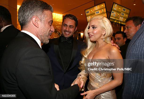 71st ANNUAL GOLDEN GLOBE AWARDS -- Pictured: Actor Taylor Kinney and singer Lady Gaga attend Universal, NBC, Focus Features, E! Sponsored by Chrysler...