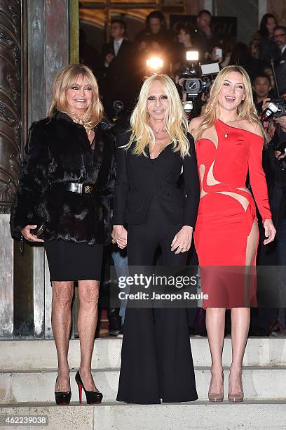 Goldie Hawn, Donatella Versace and Kate Hudson arrive at the Versace show as part of Paris Fashion Week Haute-Couture Spring/Summer 2015 on January...