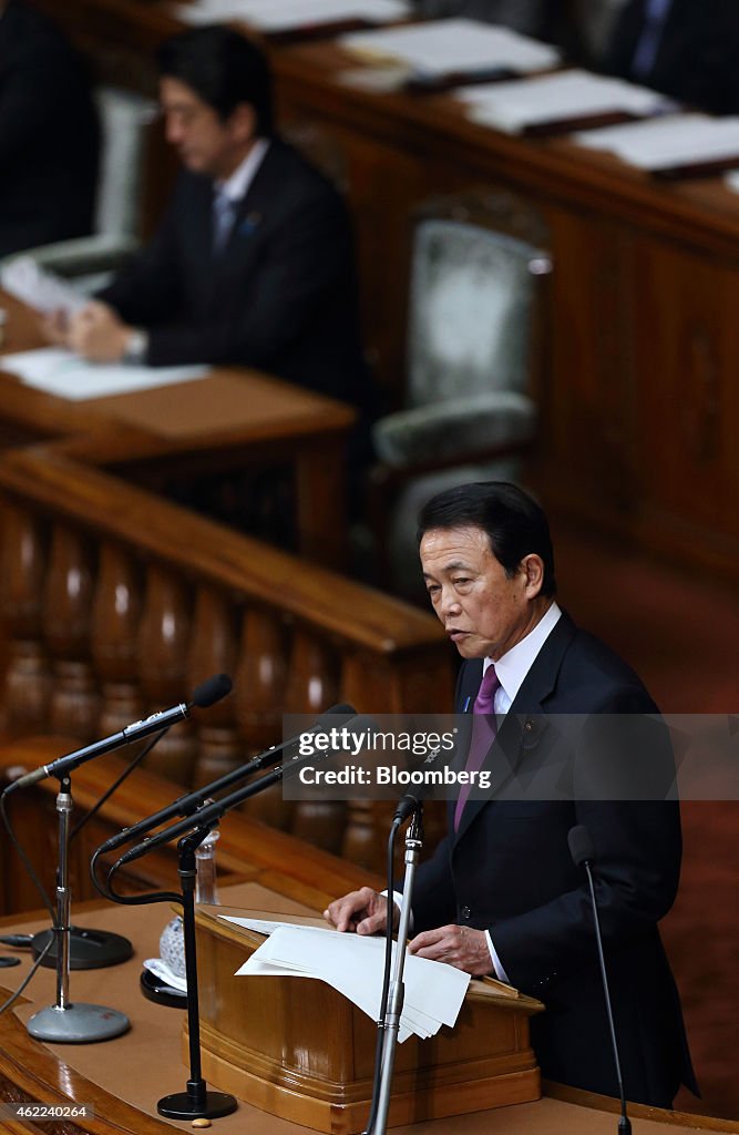 Japanese Prime Minister Shinzo Abe And Finance Minister Taro Aso Attend The Year's First Session At National Diet