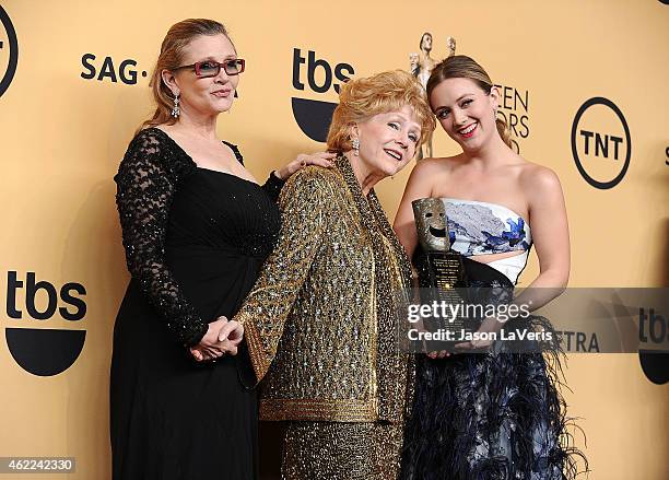 Actress Debbie Reynolds, actress Carrie Fisher and Billie Lourd pose in the press room at the 21st annual Screen Actors Guild Awards at The Shrine...