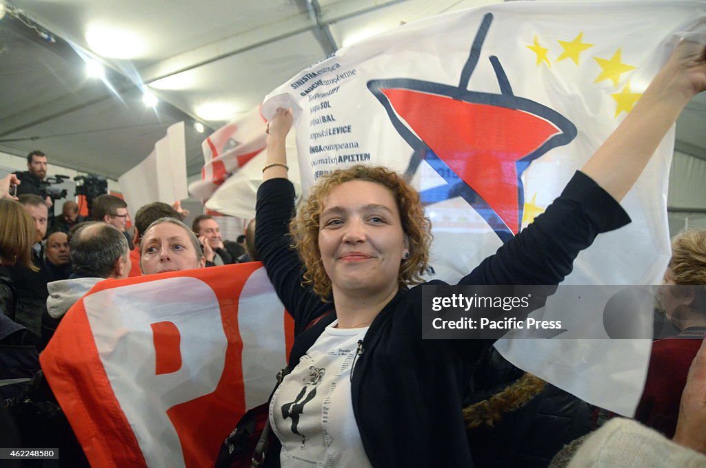 SYRIZA supporters celebrate its victory in its main election...