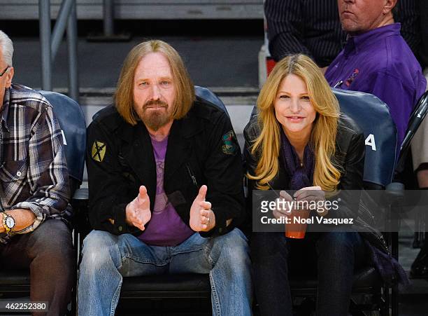 Tom Petty and Dana York attend a basketball game between the Houston Rockets and the Los Angeles Lakers at Staples Center on January 25, 2015 in Los...