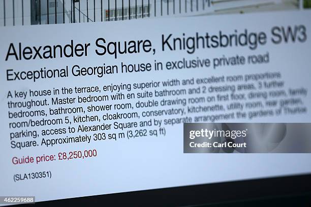 An advert for a luxury property is seen in the window of an estate agent on January 23, 2015 in west London, England. The Labour Party has proposed a...