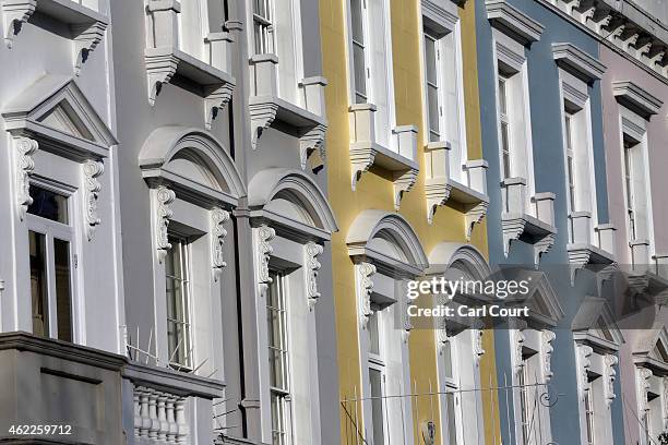 Houses are seen on January 23, 2015 in an affluent area of west London, England. The Labour Party has proposed a Mansion Tax under which properties...