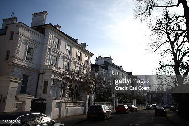 Houses are seen on January 23, 2015 in an affluent area of west London, England. The Labour Party has proposed a Mansion Tax under which properties...