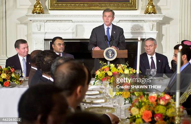 President George W. Bush, with US Attorney General John Ashcroft , Saudi Ambassador Prince Bandar bin Sultan binAbd al-Aziz al-Saud and US Secretary...