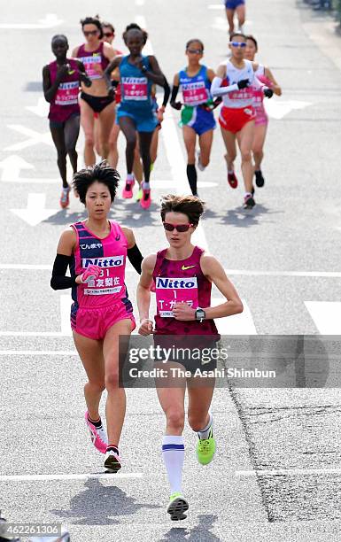 Tatiana Gamera of Russia and Risa Shigetomo of Japan lead the pack during the 2015 Osaka Women's Marathon on January 25, 2015 in Osaka, Japan.
