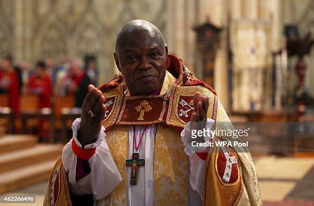 The Archbishop of York, Dr John Sentamu applauds during the Reverend Libby Lane's consecration as the eighth Bishop of Stockport at York Minster on...