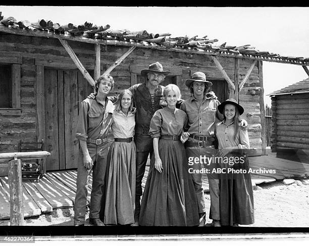 The Macahans" - Airdate: January 19, 1976. L-R: WILLIAM KIRBY CULLEN;KATHRYN HOLCOMB;JAMES ARNESS;EVA MARIE SAINT;BRUCE BOXLEITNER;VICKI SCHRECK