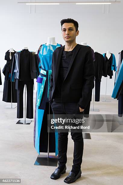 Designer Rad Hourani poses during the Rad Hourani presentation as part of the Paris Fashion Week Haute Couture Spring/Summer 2015 at the Canada...