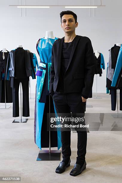 Designer Rad Hourani poses during the Rad Hourani presentation as part of the Paris Fashion Week Haute Couture Spring/Summer 2015 at the Canada...