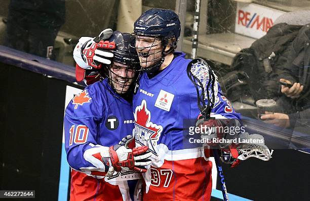 Toronto, Canada - January 23 - In fourth quarter action, Rock's Rob Hellyer celebrates with Brodie Merrill who just scored a shorthanded goal late in...