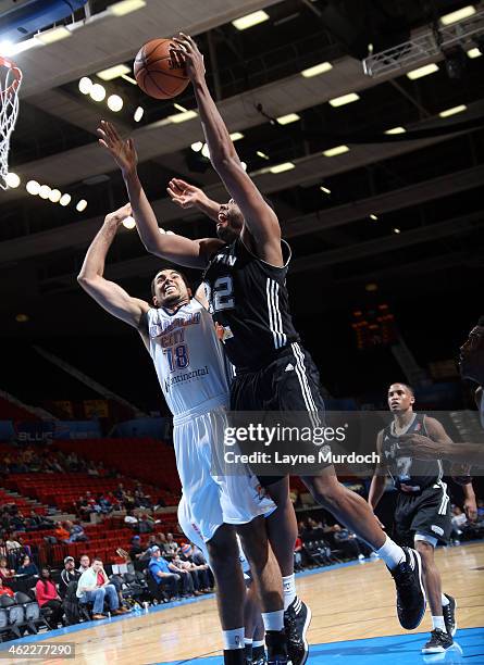 Keith Wright of the Austin Spurs shoots against Grant Jerrett of the Oklahoma City Blue during an NBA D-League game on January 24, 2015 at the Cox...