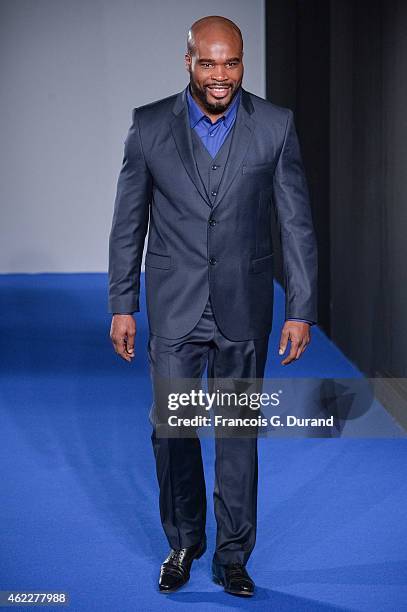 Jean-Marc Mormeck walks the runway during the Agnes B. Menswear Fall/Winter 2015-2016 show as part of Paris Fashion Week on January 25, 2015 in...