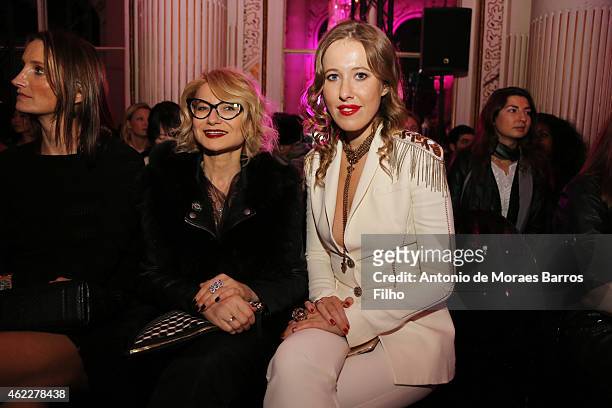 Evelina Khromtchenko and Ksenia Sobchak attends the Versace show as part of Paris Fashion Week Haute Couture Spring/Summer 2015 on January 25, 2015...
