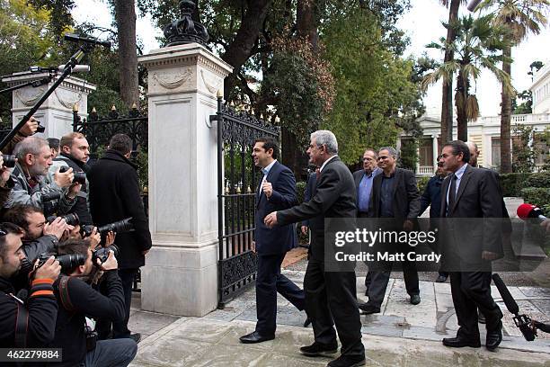 Syriza party leader Alexis Tsipras leaves after being sworn in by Greek President Karolos Papoulias as Greece's new Prime Minister at the...