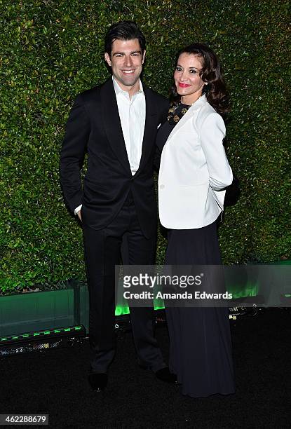 Actor Max Greenfield and his wife Tess Sanchez arrive at the FOX/FX Golden Globe Party at the FOX Pavilion at the Golden Globes on January 12, 2014...