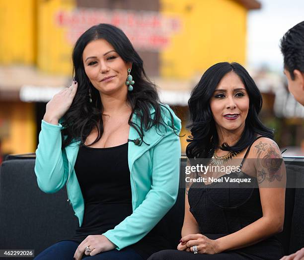 Jenni "JWoww" Farley and Nicole "Snooki" LaValle visit "Extra" at Universal Studios Hollywood on January 26, 2015 in Universal City, California.