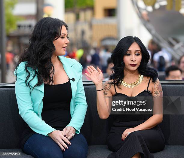 Jenni "JWoww" Farley and Nicole "Snooki" LaValle visit "Extra" at Universal Studios Hollywood on January 26, 2015 in Universal City, California.