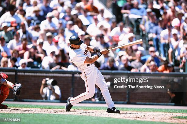 Benito Santiago of the San Francisco Giants bats during a game against the St. Louis Cardinals on July 1, 2001 in San Francisco, California.