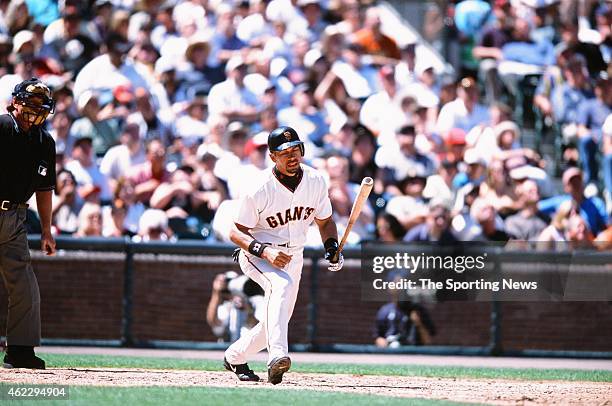 Benito Santiago of the San Francisco Giants bats during a game against the St. Louis Cardinals on July 1, 2001 in San Francisco, California.