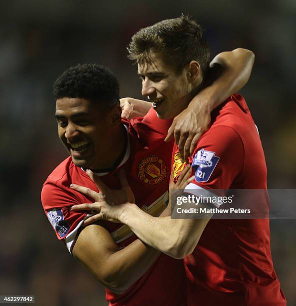 Patrick McNair of Manchester United U21s celebrates scoring their second goal during the Barclays U21 Premier League match between Manchester United...