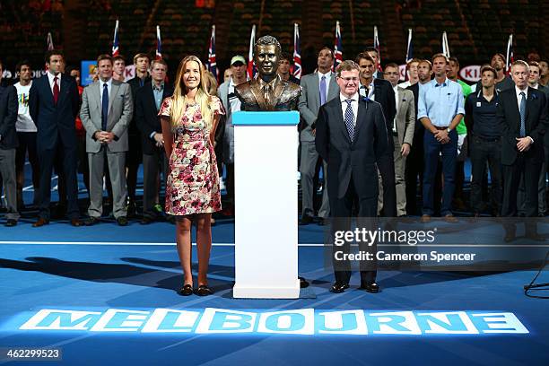 Tennis Australia President Steve Healy and Ally Drewett unveil a bust of her father, Brad Drewett during day one of the 2014 Australian Open at...