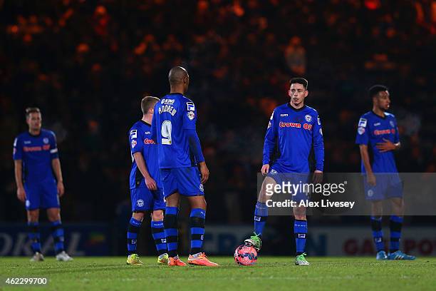 Calvin Andrew and Ian Henderson of Rochdale prepare to restart after conceding the fourth goal during the FA Cup fourth round match between Rochdale...
