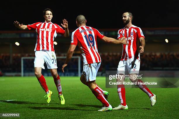 Jonathan Walters of Stoke City celebrates after scoring their fourth goal with team mates Philipp Wollscheid and Marc Wilson of Stoke City during the...