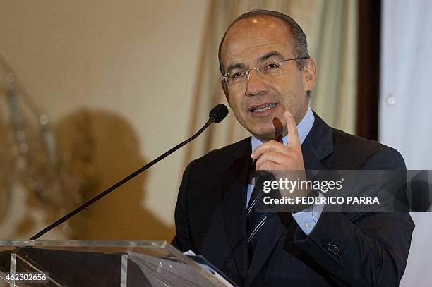 Former Mexican president Felipe Calderon delivers a speech during the Citizen Congress being held in Caracas on January 26, 2015. AFP PHOTO/FEDERICO...