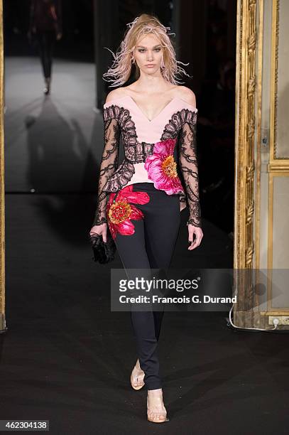 Model walks the runway during the Alexis Mabille show as part of Paris Fashion Week Haute Couture Spring/Summer 2015 on January 26, 2015 in Paris,...