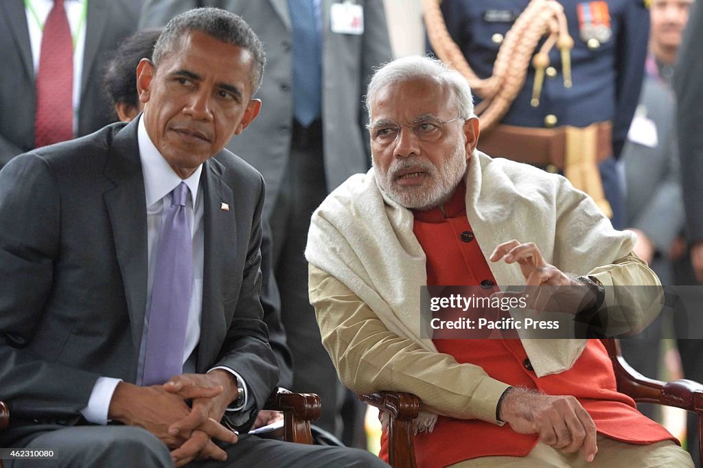 The Prime Minister of India, Narendra Modi (right), with...