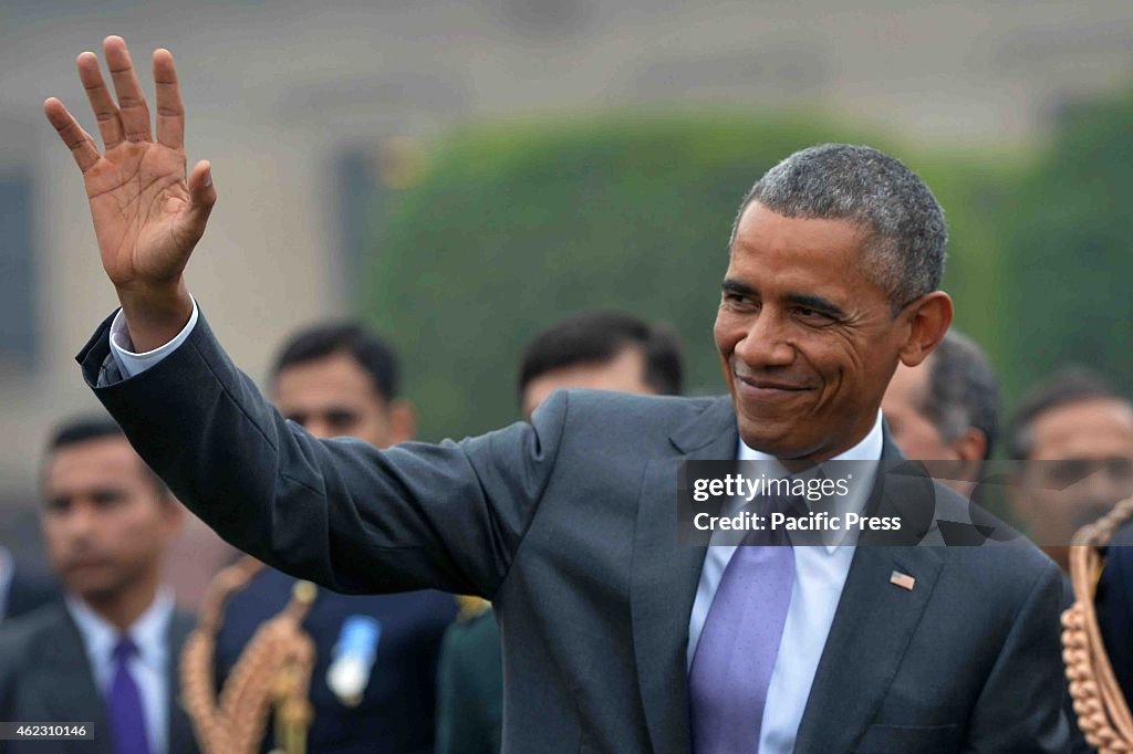 The US President, Barack Obama waves to the people during...