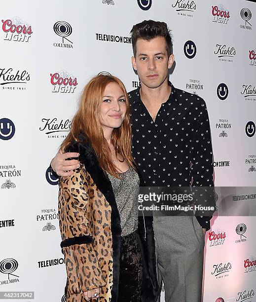 Josephine de La Baume and Mark Ronson arrive at Mark's album launch party at BBC Television Centre on January 23, 2015 in London, England.